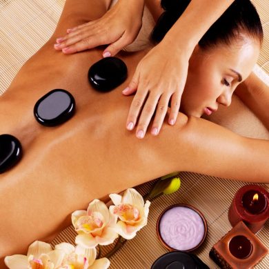 Adult-woman-having-hot-stone-m
